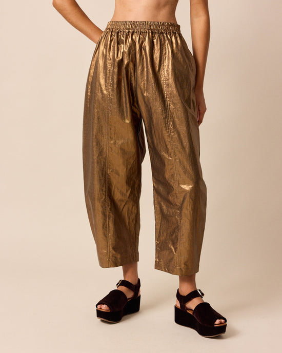 model wears mabel bronze linen trousers front
