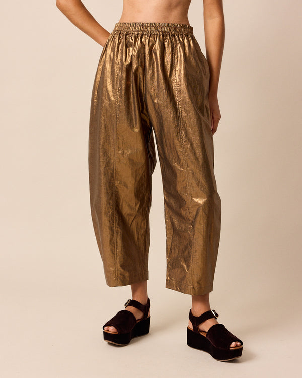 model wears mabel bronze linen trousers front
