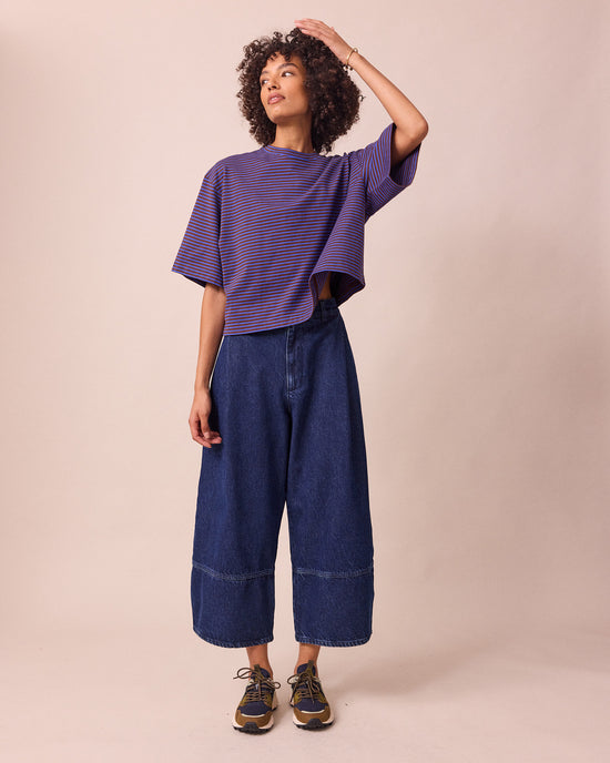 model wears nova brown and blue stripe jersey top