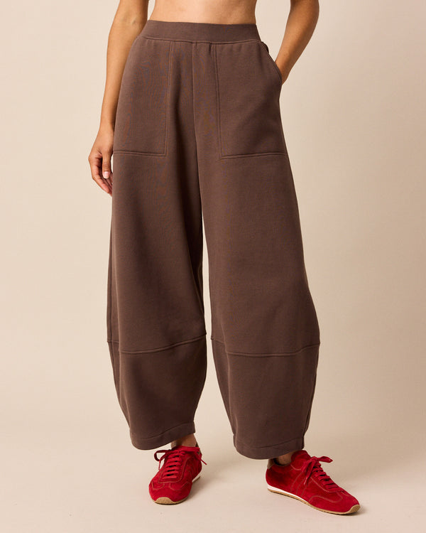 model wears pascale chocolate fleeceback jersey trousers front