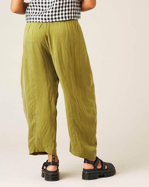 model wears olive cupro mabel trousers back