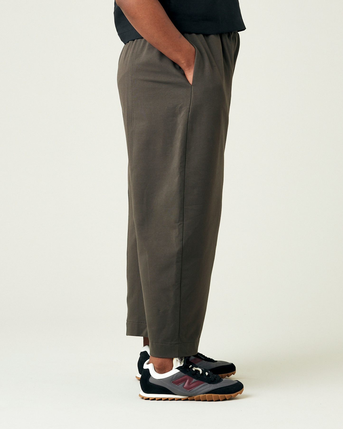 model wears espresso mabel jersey mabel trousers right