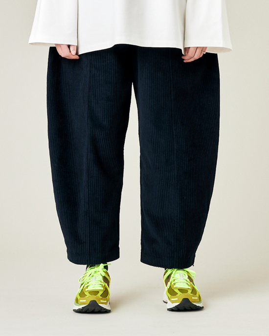 model wears true navy cord mabel trousers front