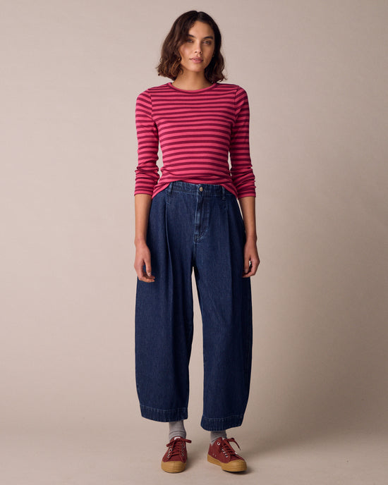 model wears lila raspberry and damson jersey top