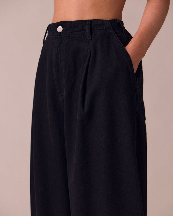 model wears veda true black denim jeans