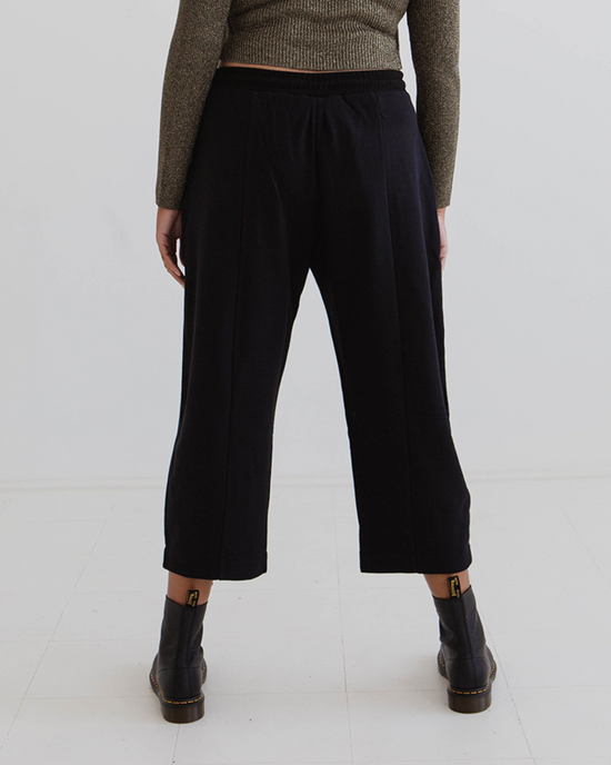 model wears black jersey jenny trousers back