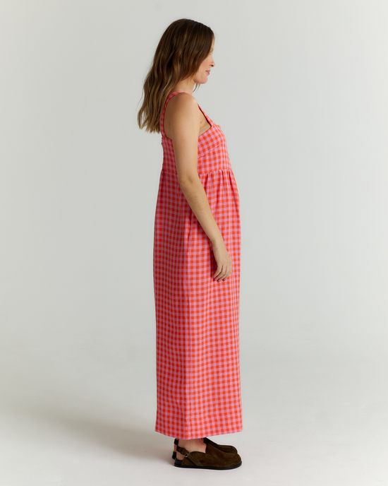 pregnant model wears pink and tomato check cari jumpsuit