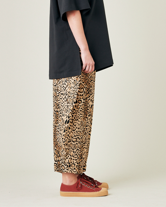 model wears leopard print cupro mabel trousers right