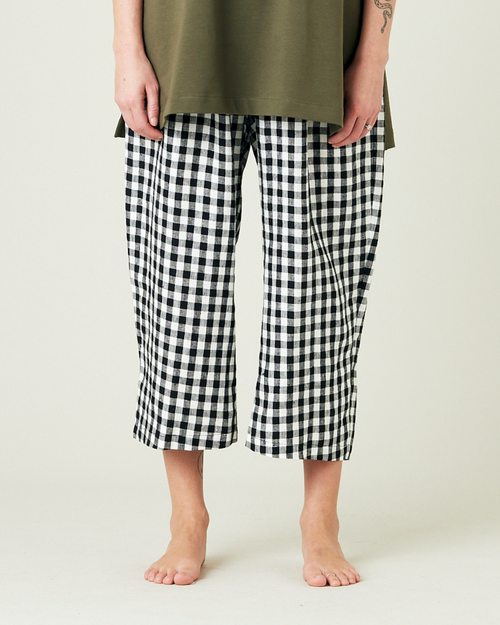 model wears black and white gingham ultimate pj linen trousers