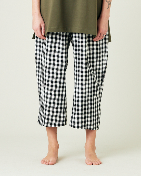 model wears black and white gingham ultimate pj linen trousers