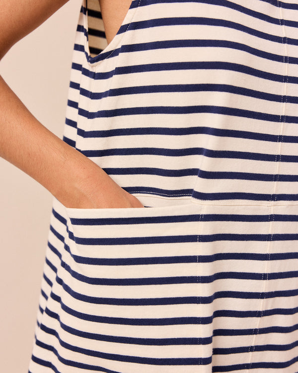 model wears a bree navy and ecru stripe tunic
