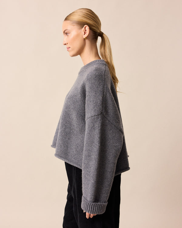 model wears coco charcoal knitted jumper