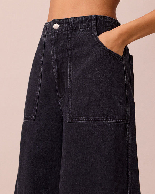 model wears dani washed black denim jeans