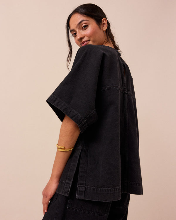 model wears deedee washed black denim top