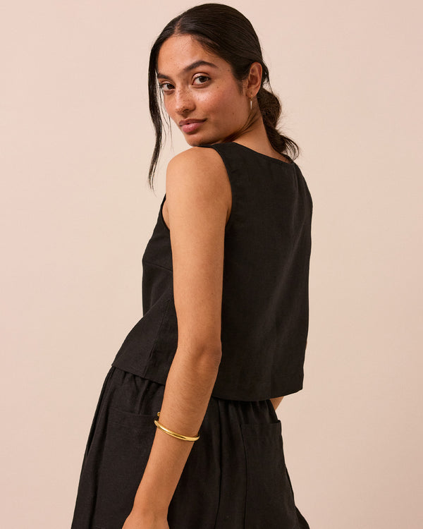 model wears black elodie linen top