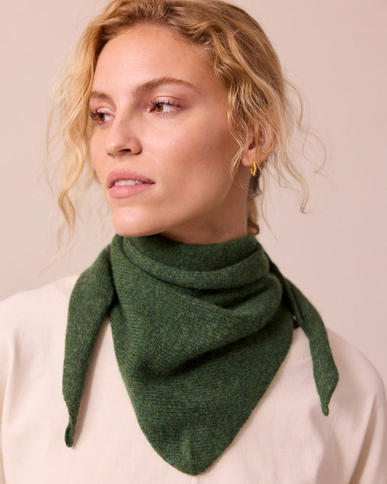 model wears knitted apple green neckerchief