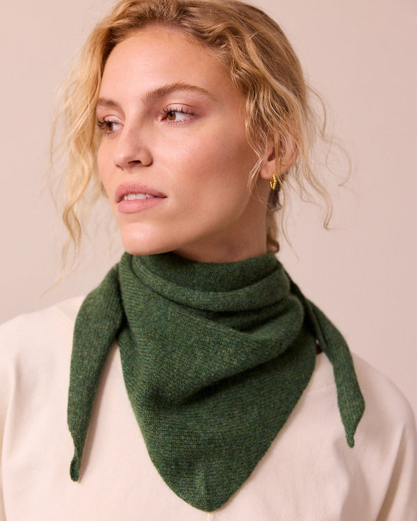 model wears knitted apple green neckerchief