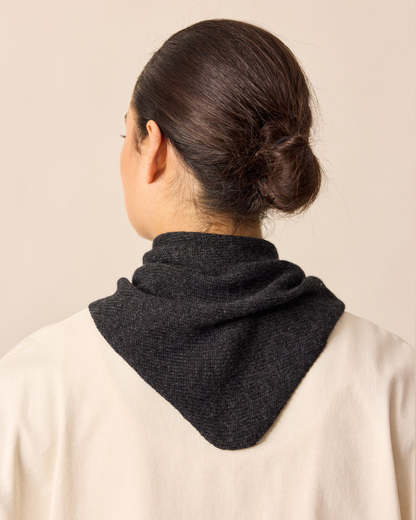model wears charcoal knitted necerchief