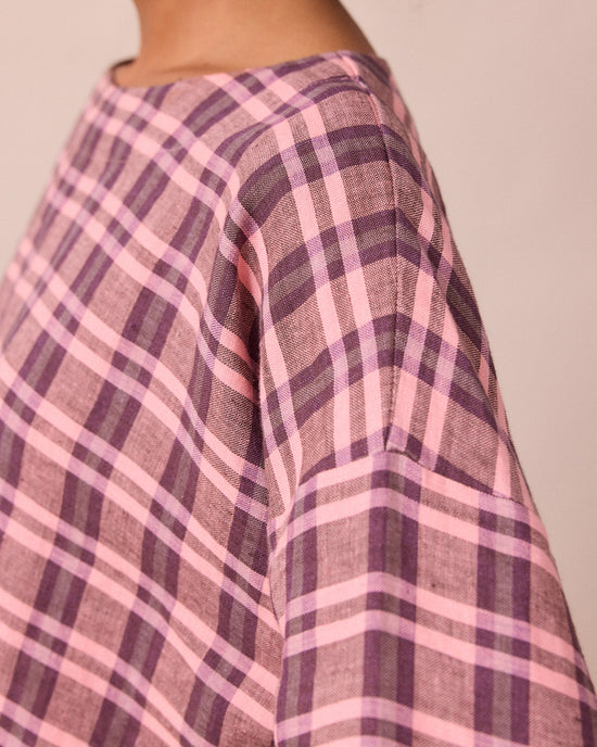 model wears lily dewberry check linen top