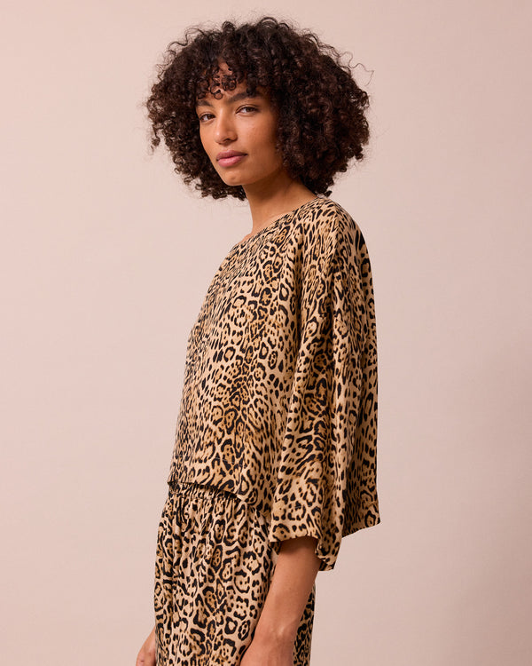 model wears lily leopard print cupro top