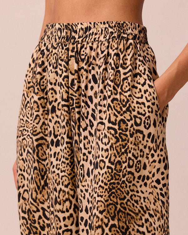 model wears mabel leopard print cupro trousers