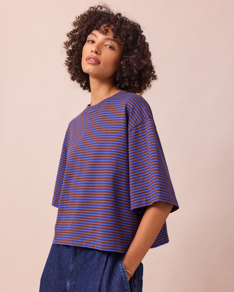 model wears nova brown and blue stripe jersey top