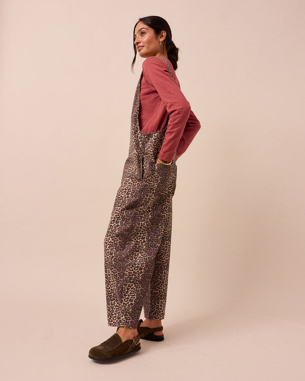 model wears leopard print ottie jumpsuit