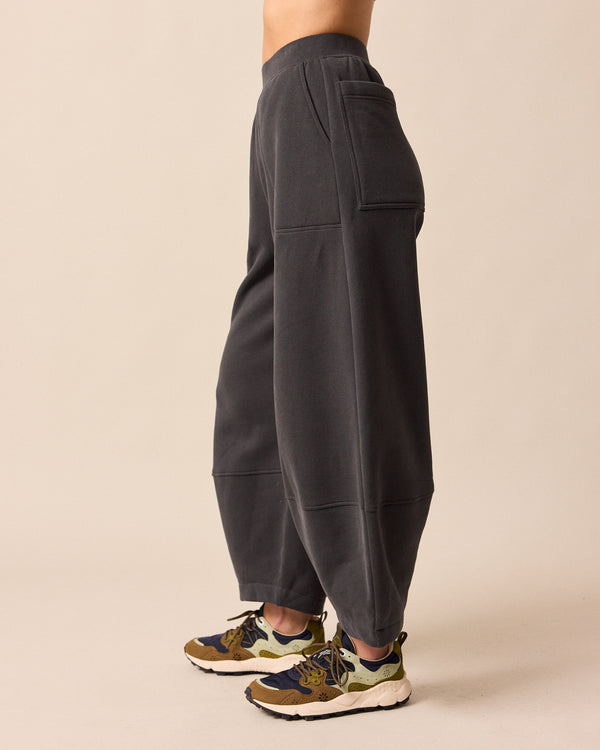 model wears pascale slate fleeceback jersey trousers left