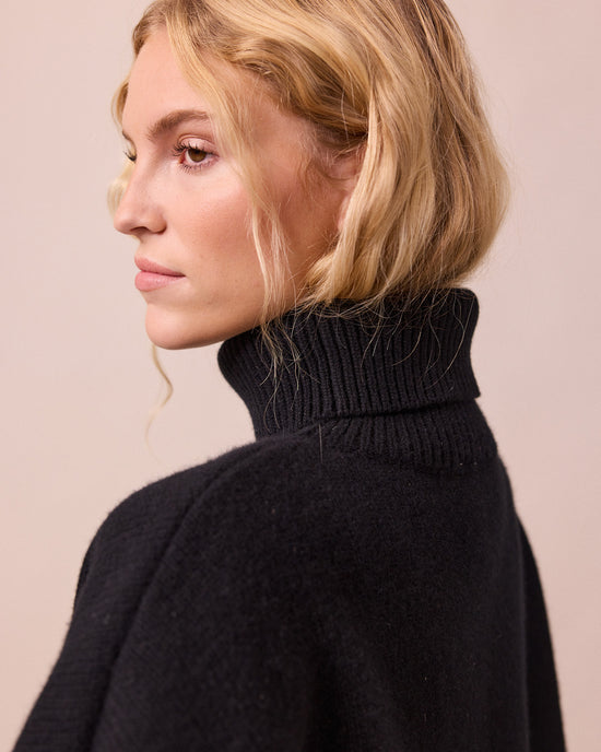 model wears ruth black knitted jumper