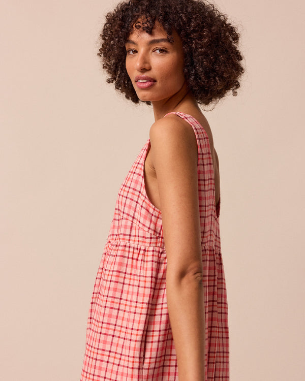 model wears savannah rosewood plaid linen jumpsuit