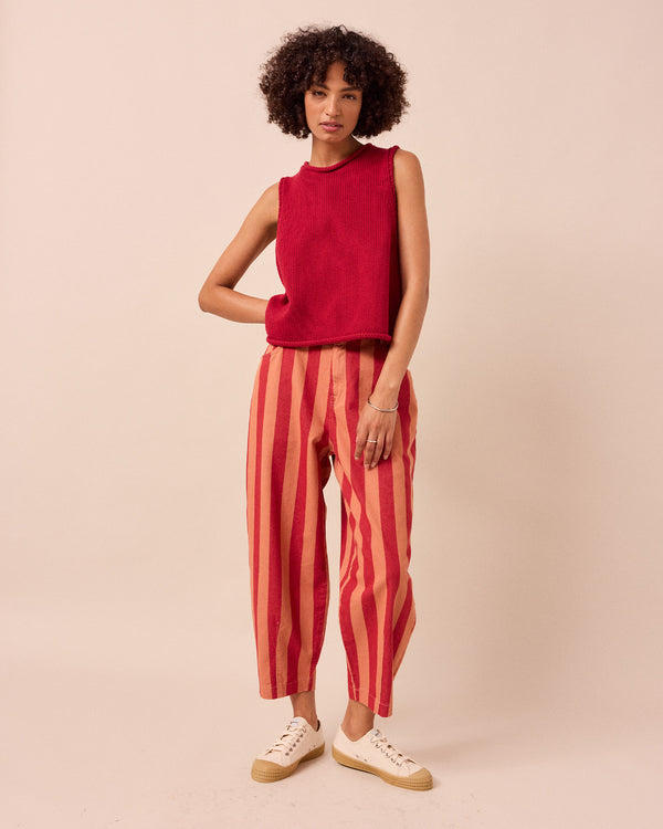 model wears tyler cranberry knitted vest