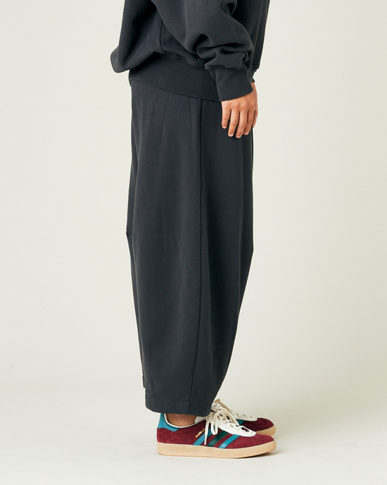 model wears slate jersey daisy trousers right