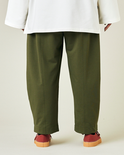 model wears olive jersey mabel trousers back