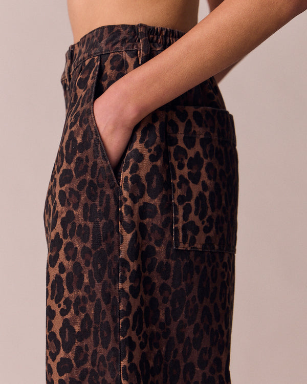model wears bonnie dark leopard denim jeans left
