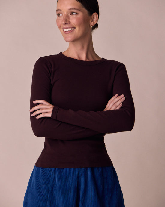 model wears lila beetroot jersey top