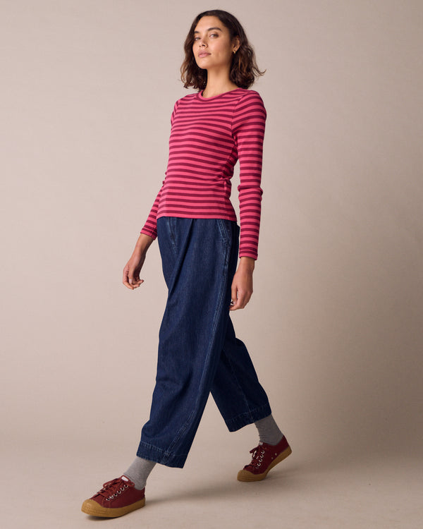 model wears lila raspberry and damson jersey top