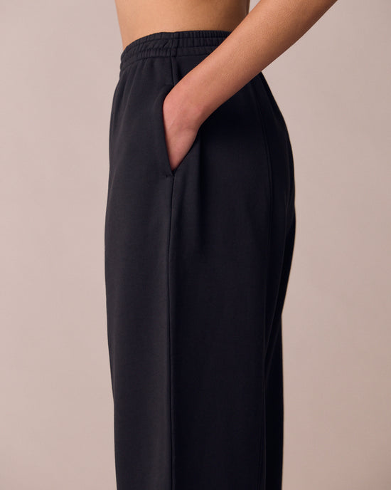model wears mabel washed black fleeceback jersey trousers