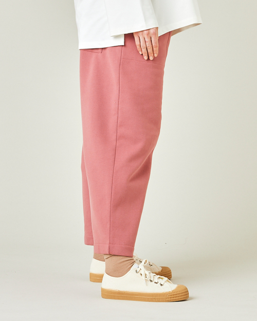 model wears dusty pink jersey huxley trousers right