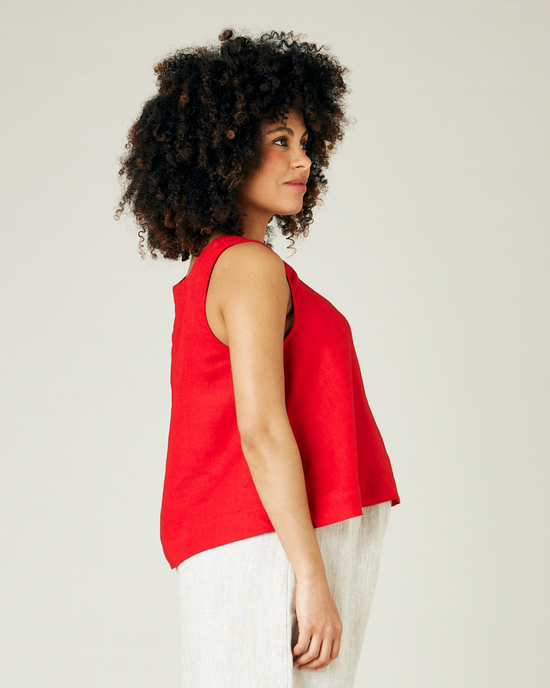 pregnant model wears red linen tara top