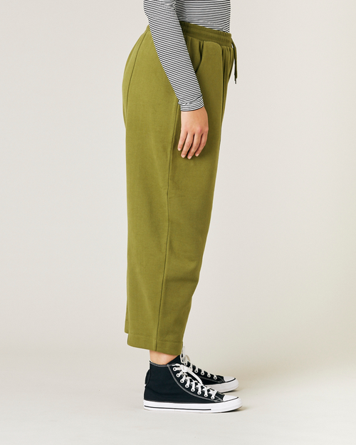 model wears avocado jersey fleece jenny trousers right