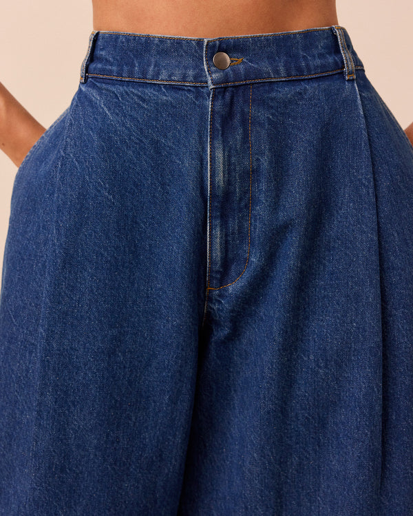 model wears blair mid wash denim jeans