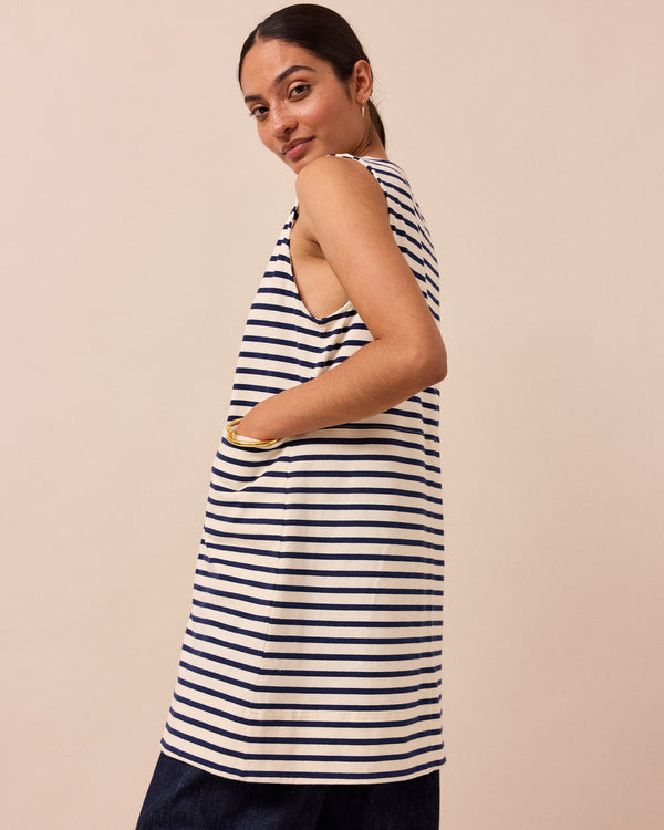 model wears a bree navy and ecru stripe tunic