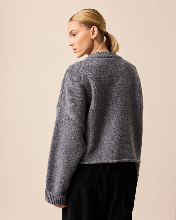 model wears coco charcoal knitted jumper