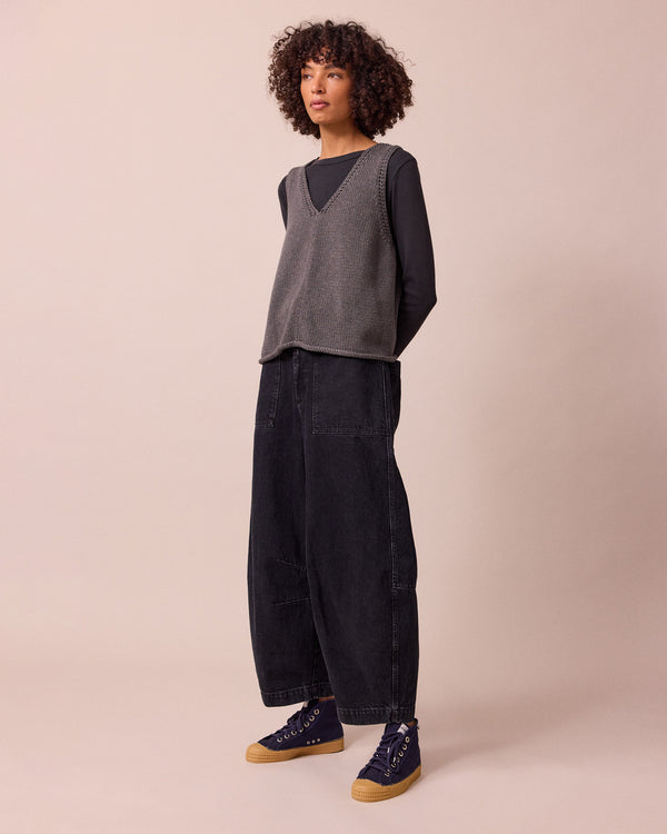 model wears dani washed black denim jeans left