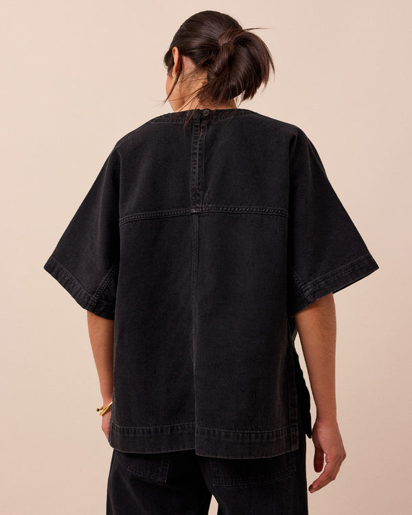 model wears deedee washed black denim top