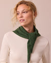 model wears knitted apple green neckerchief