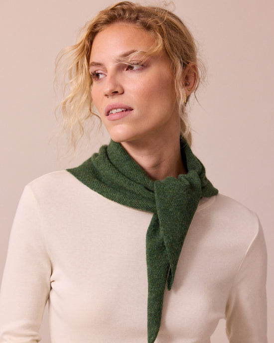 model wears knitted apple green neckerchief