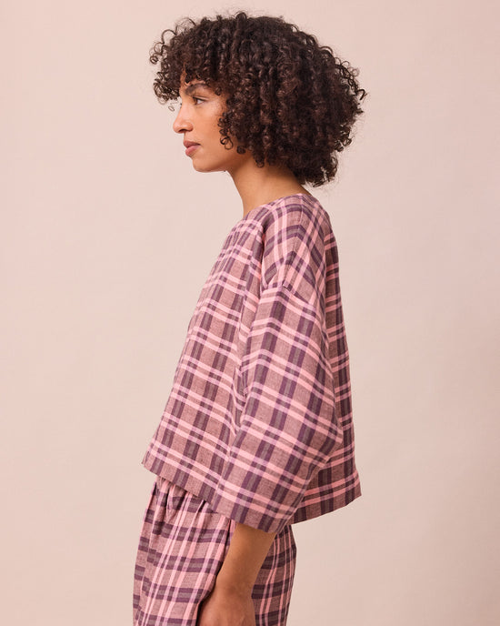 model wears lily dewberry check linen top