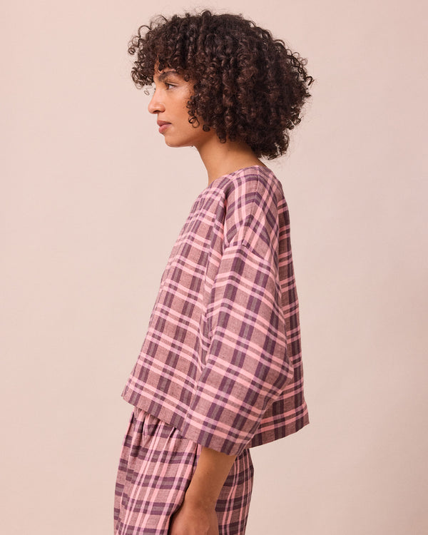 model wears lily dewberry check linen top