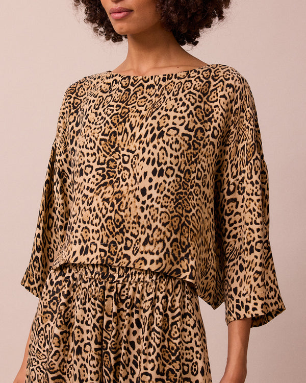model wears lily leopard print cupro top